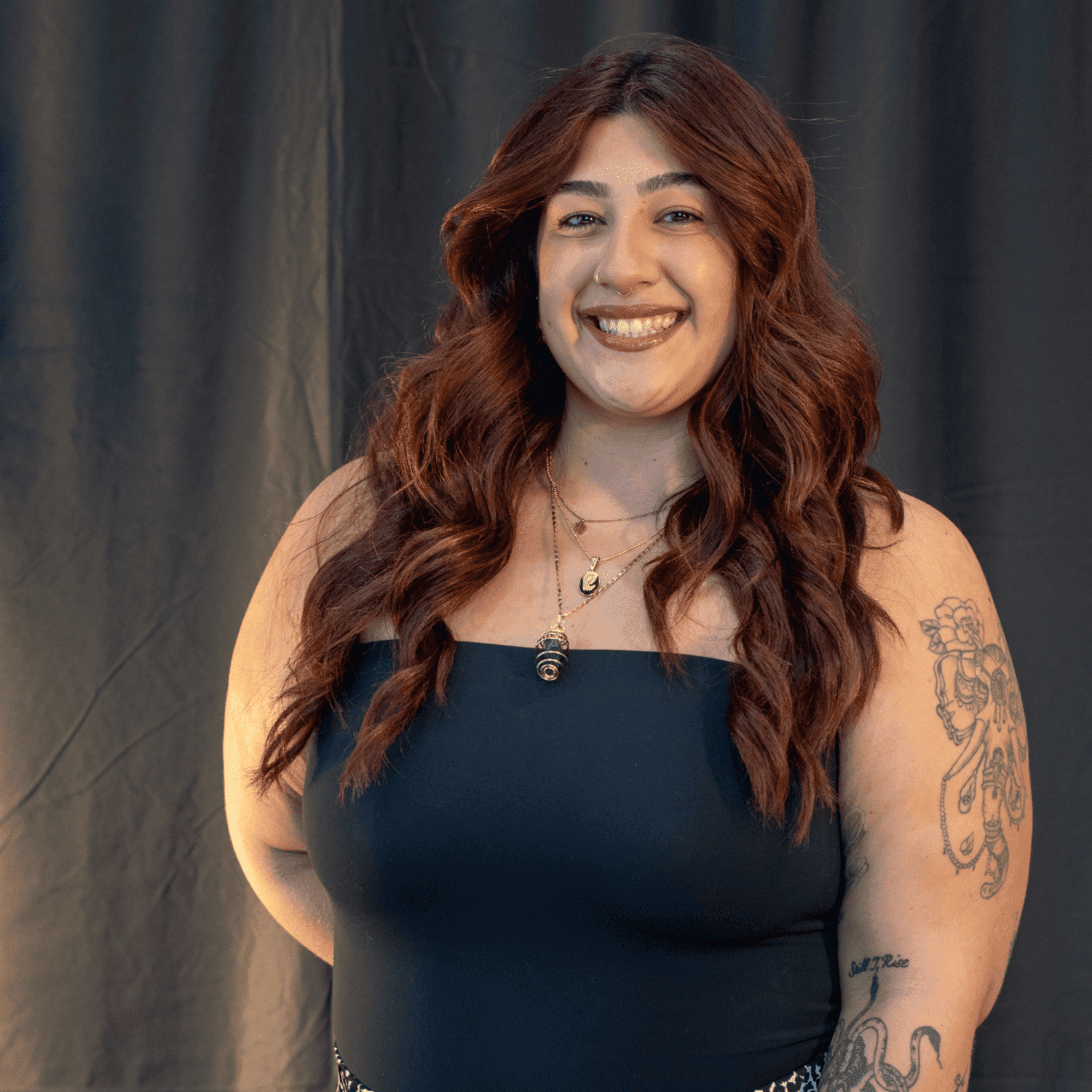 Portrait of Alejandra Largo, a professional stylist at Salon L Manayunk, showcasing their expertise and style.