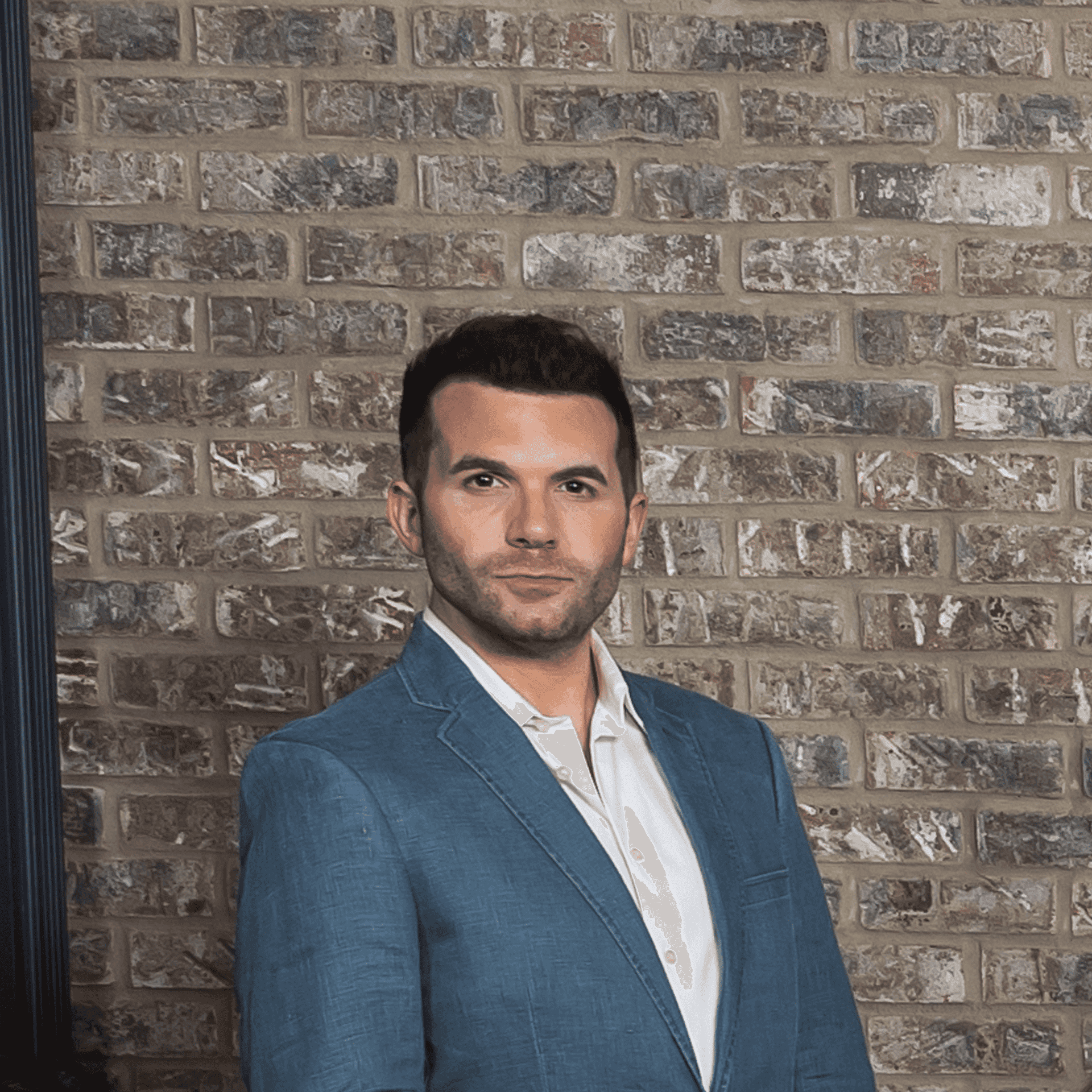 Portrait of Michael Garrity, a professional stylist at Salon L Manayunk, showcasing their expertise and style.