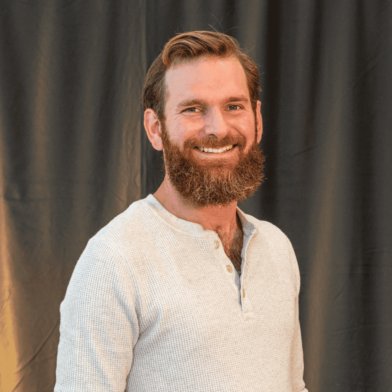 Portrait of Ryan O’Connor, a professional stylist at Salon L Manayunk, showcasing their expertise and style.