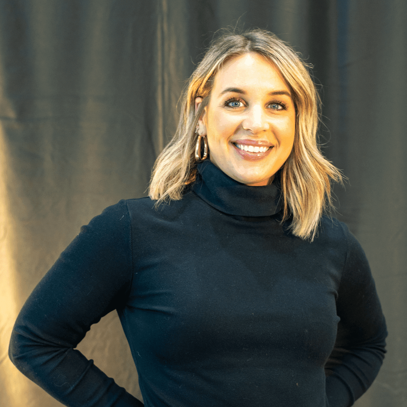 Portrait of Terri McKenzie, a professional stylist at Salon L Manayunk, showcasing their expertise and style.