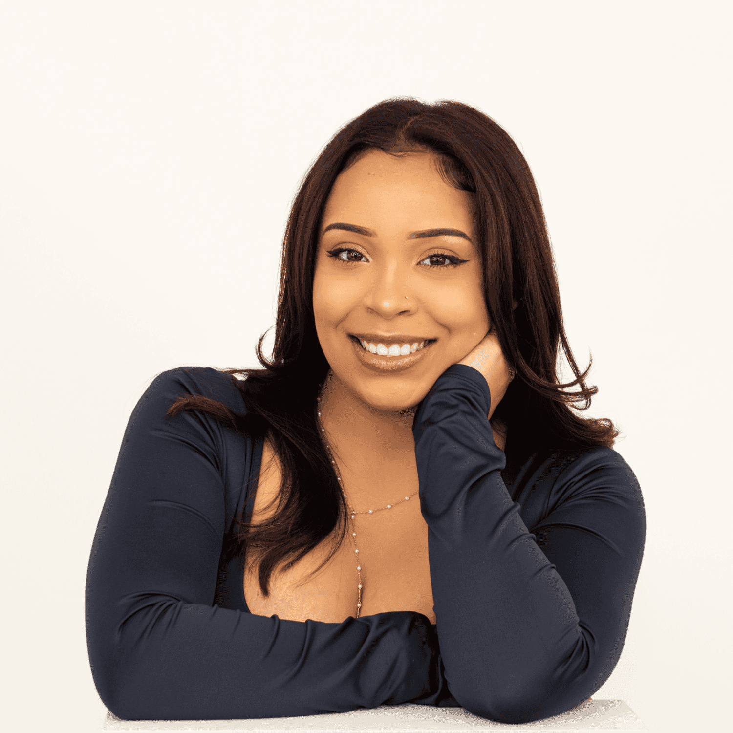 Portrait of Riannah Potts, a professional stylist at Salon L Manayunk, showcasing their expertise and style.