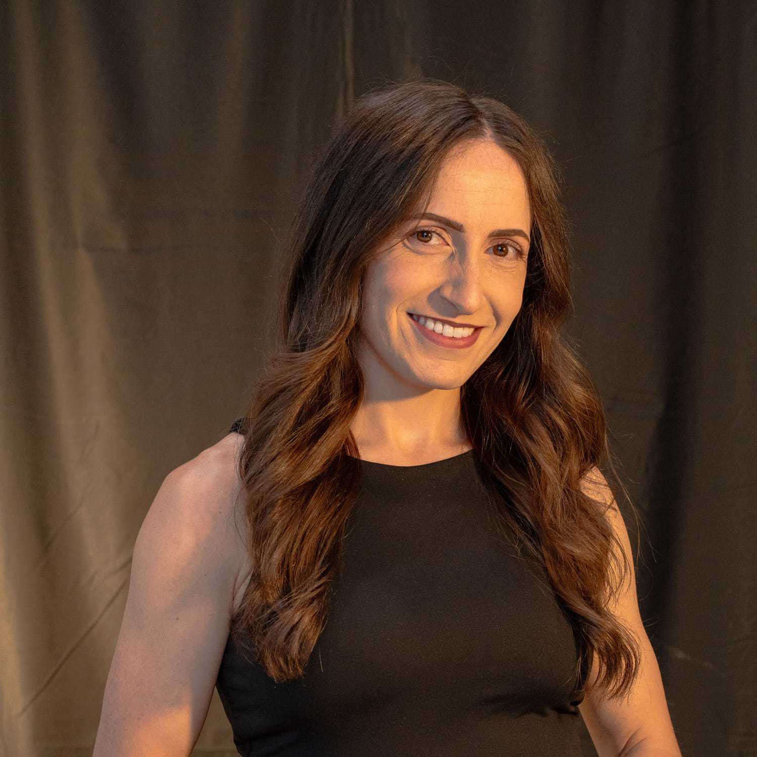 Portrait of Danni Semenza, a professional stylist at Salon L Manayunk, showcasing their expertise and style.