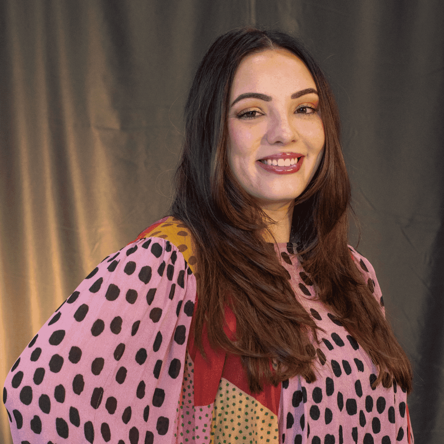 Portrait of Reilly Truitt, a professional stylist at Salon L Manayunk, showcasing their expertise and style.