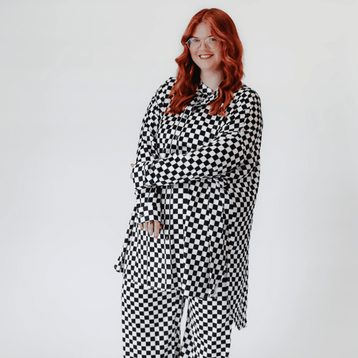 Portrait of Cayla Kidd, a professional stylist at Salon L Manayunk, showcasing their expertise and style.