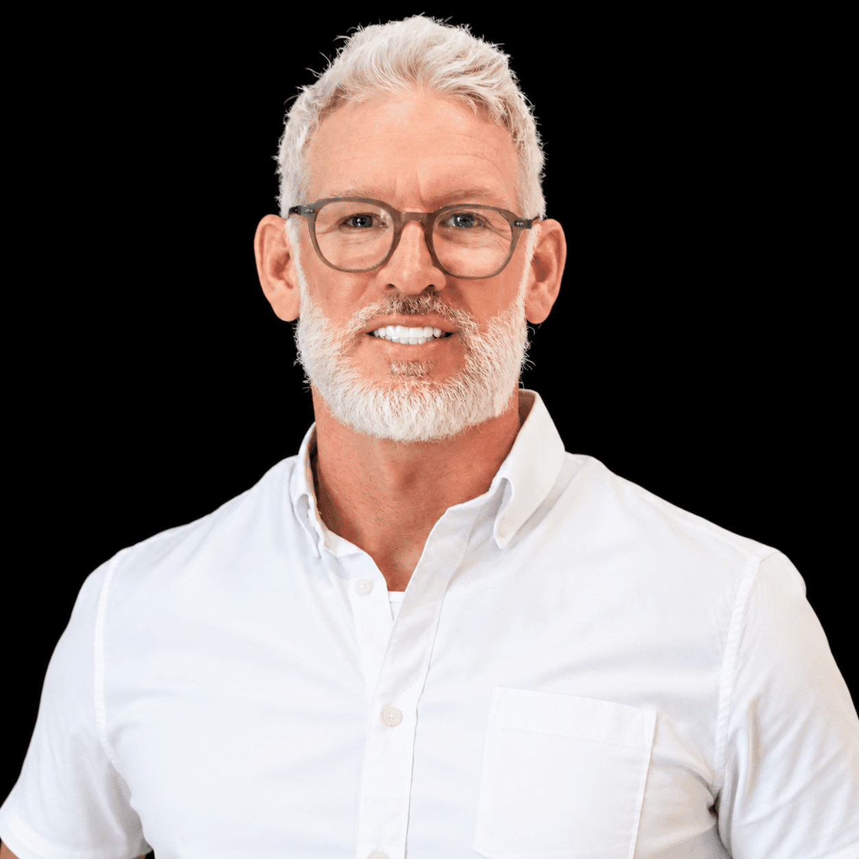 Portrait of Michael O’Connor, a professional stylist at Salon L Manayunk, showcasing their expertise and style.