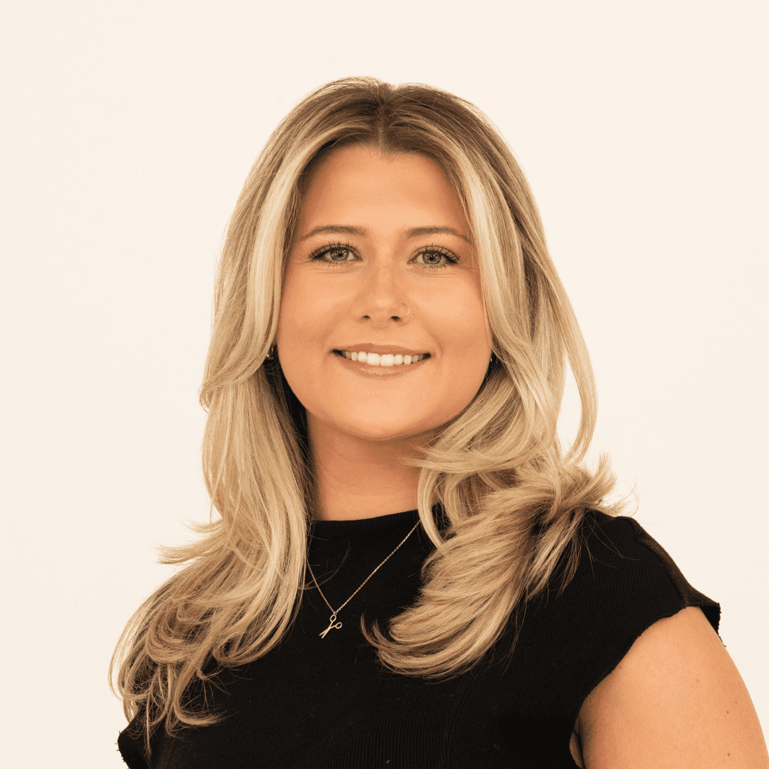 Portrait of Natalie Banff, a professional stylist at Salon L Manayunk, showcasing their expertise and style.