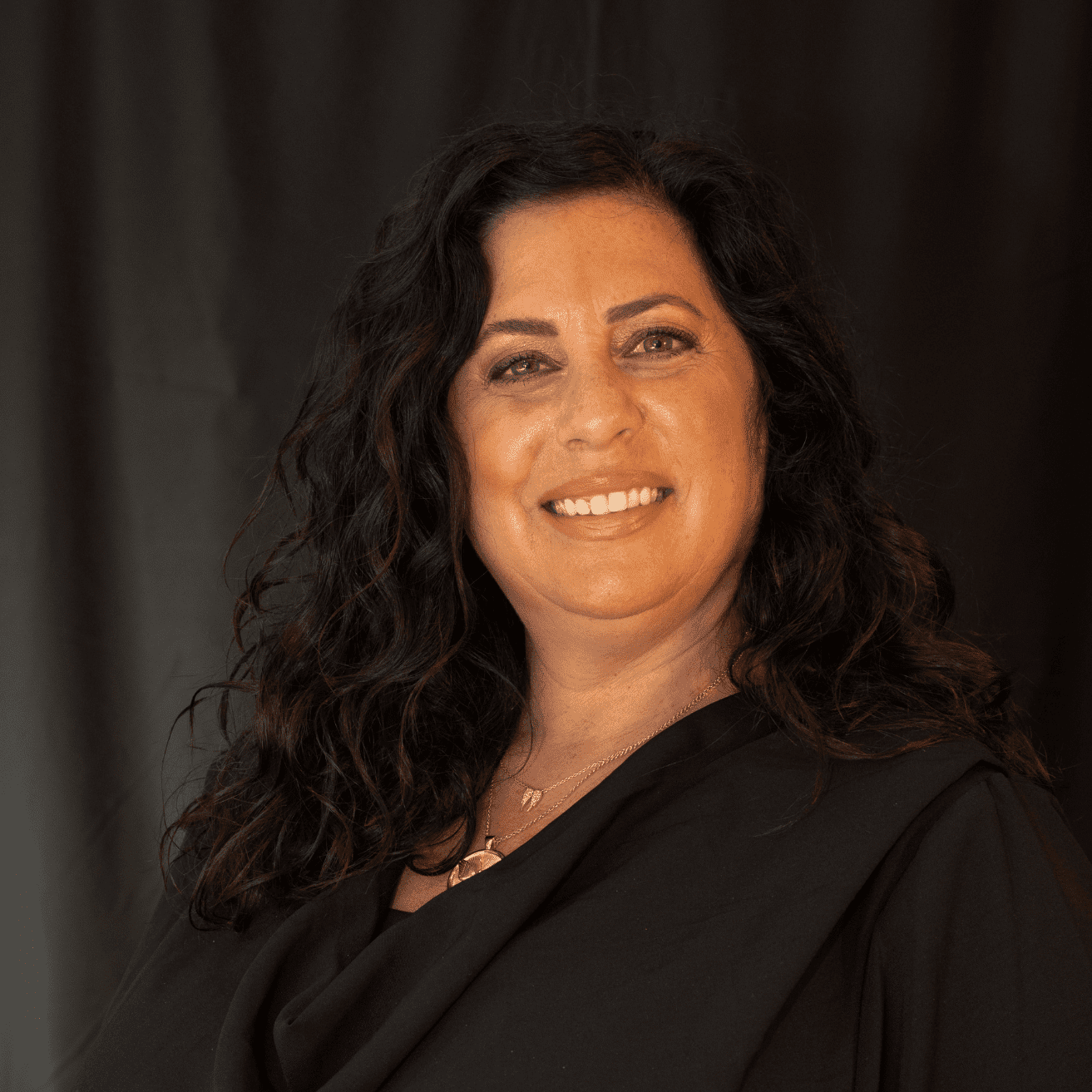 Portrait of Stefanie Butcher, a professional stylist at Salon L Manayunk, showcasing their expertise and style.