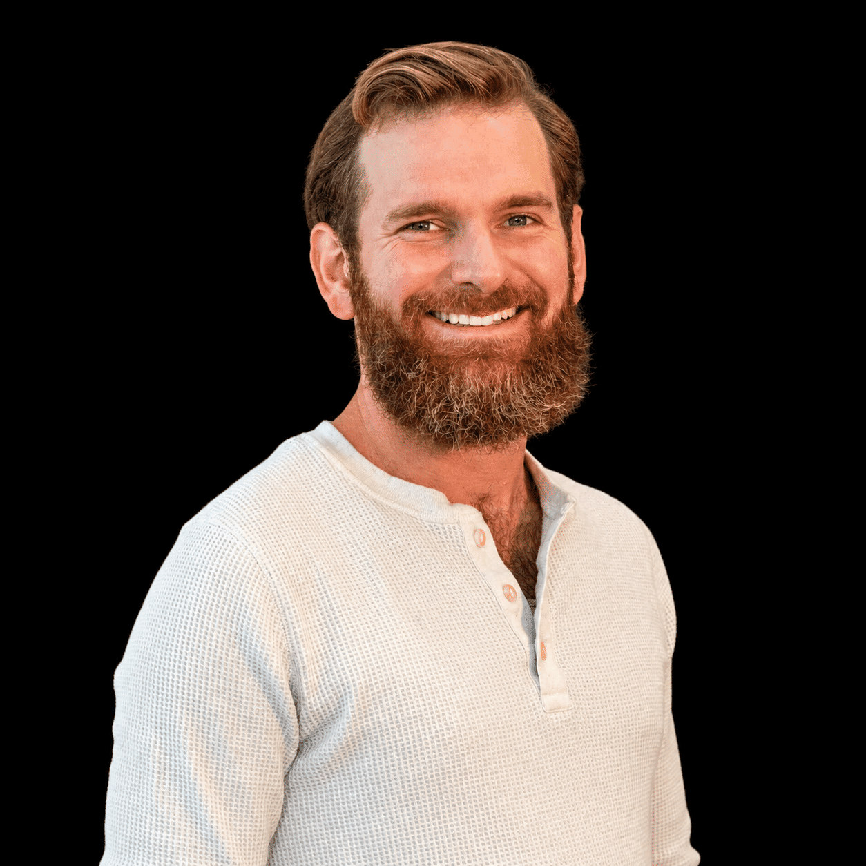 Portrait of Ryan O’Connor, a professional stylist at Salon L Manayunk, showcasing their expertise and style.