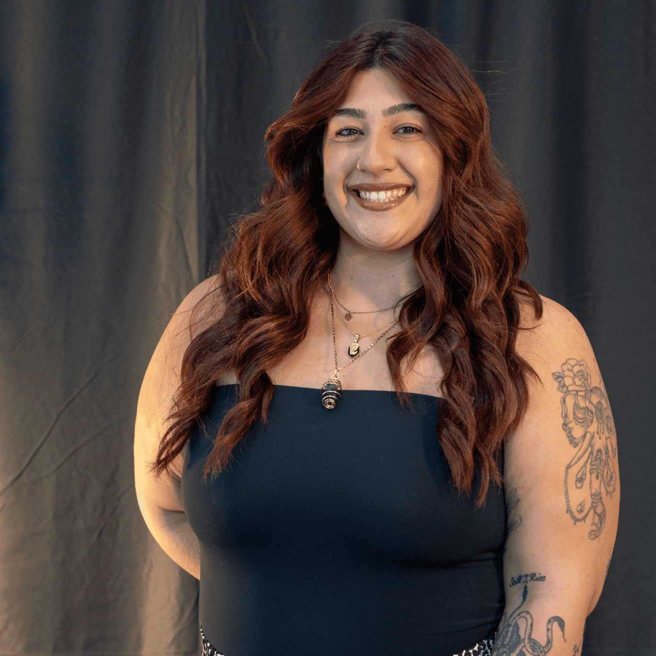 Portrait of Alejandra Largo, a professional stylist at Salon L Manayunk, showcasing their expertise and style.