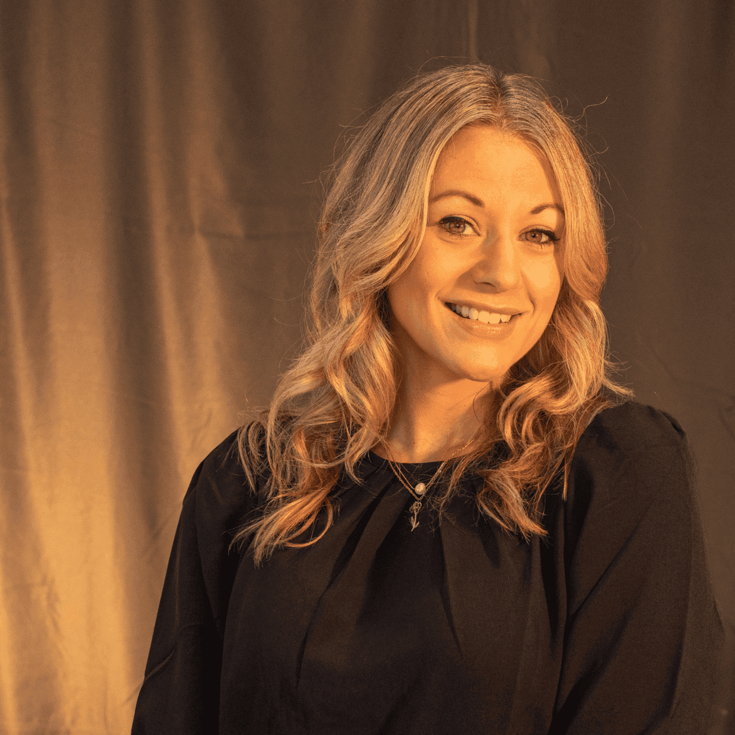 Portrait of Nancy Babcock, a professional stylist at Salon L Manayunk, showcasing their expertise and style.